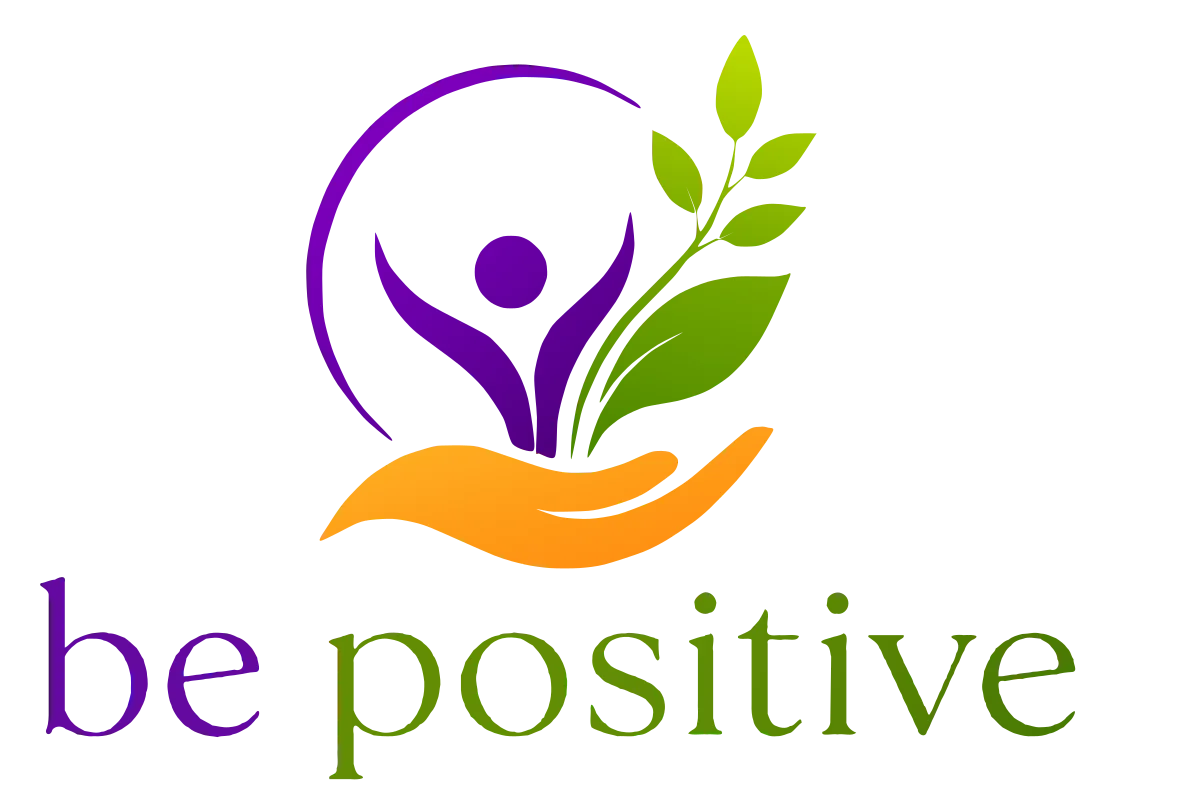 Be Positive logo: a purple figure with raised arms and green leaves rising from an open orange hand inside a sweeping purple arc, above be positive in purple and green lettering