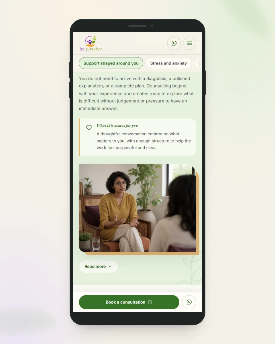 Phone frame showing a Be Positive service page with a sticky bar along the foot of the screen holding a Book a consultation button beside a WhatsApp button, and a WhatsApp button in the header